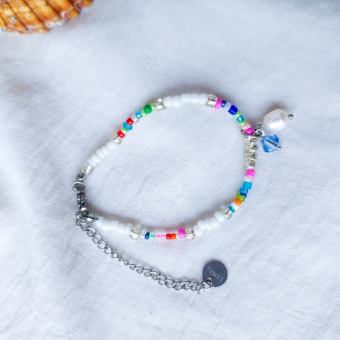 Handmade natural river pearl beaded anklet. The delight of all seaside lovers!  With acrylic beads, nylon thread and stainless steal hook.