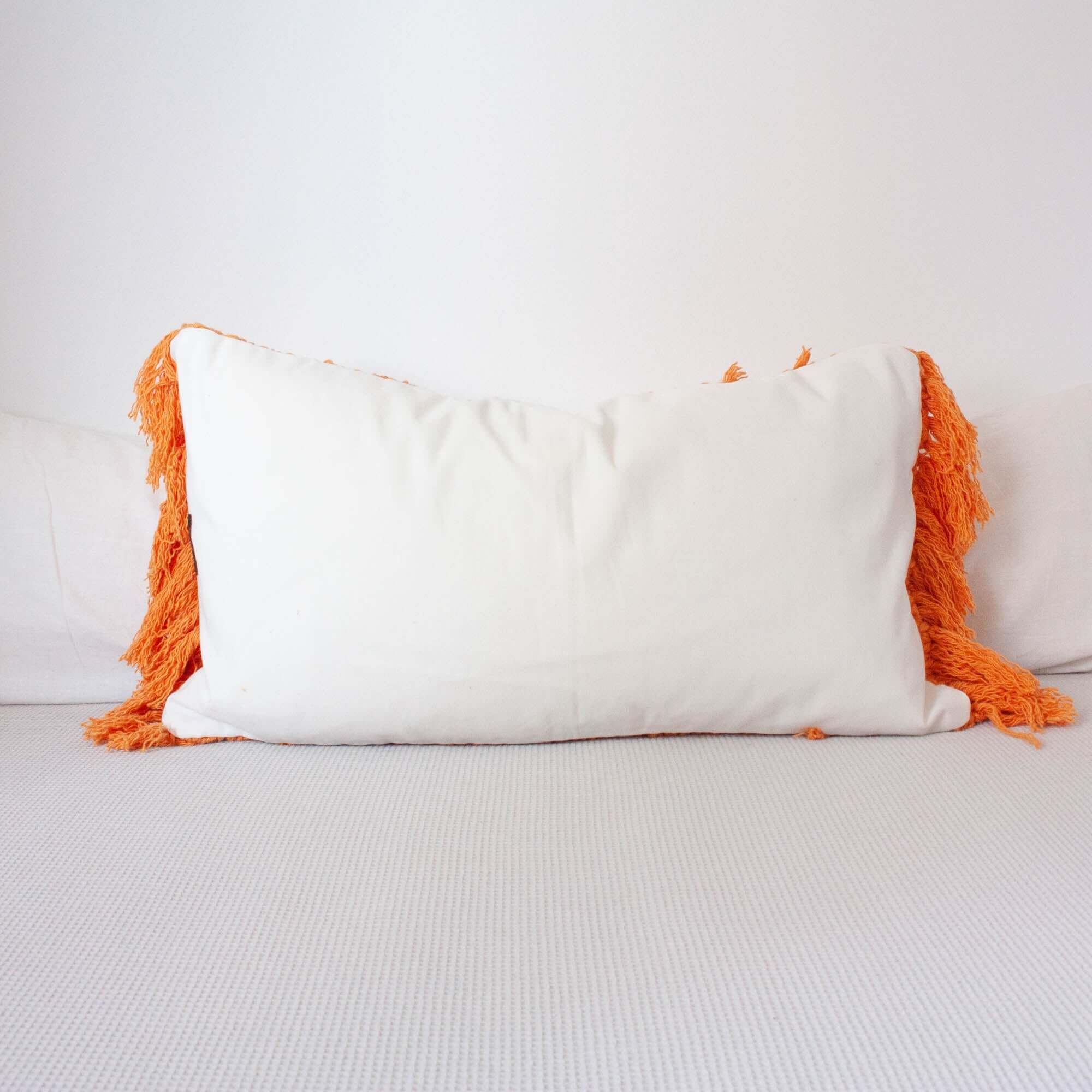 Crochet Pillow “Textures from the Loom” – Orange Fringes