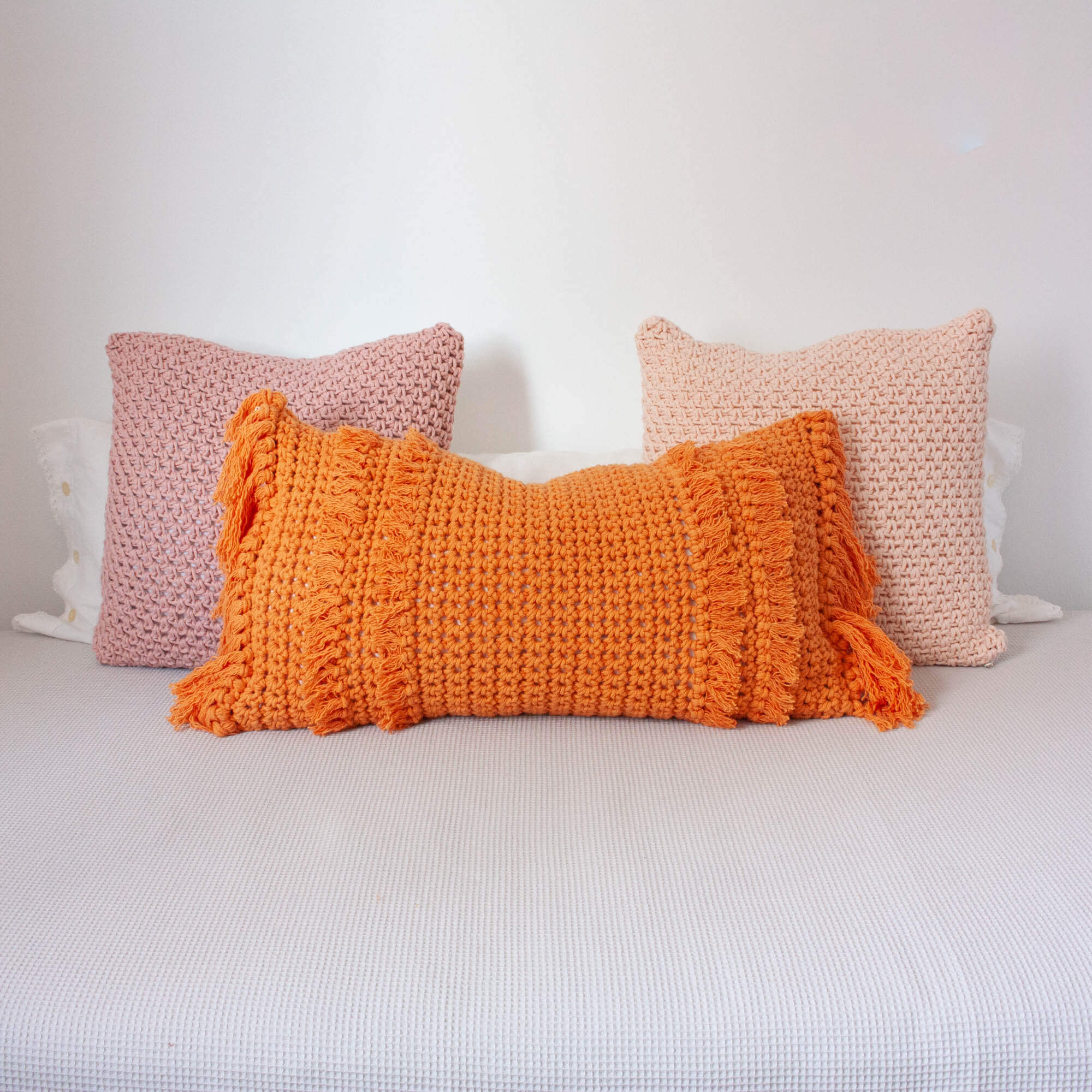 Crochet Pillow “Textures from the Loom” – Orange Fringes