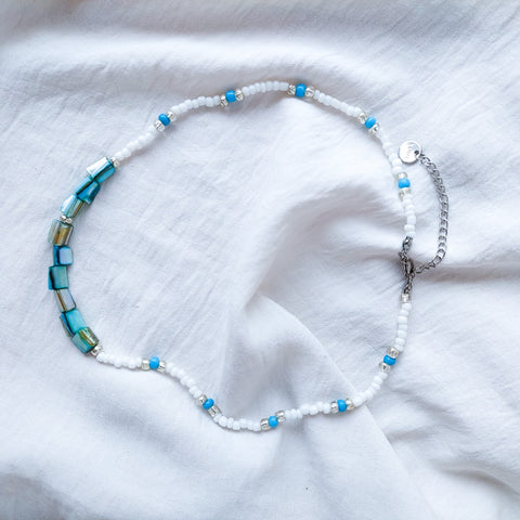 Handmade blue mother of pearl beaded necklace. With acrylic beads, nylon thread and stainless steal hook.