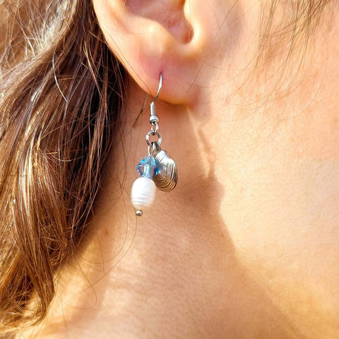 Handmade natural river pearl and seashell dangle earrings. The delight of all seaside lovers!  With acrylic beads and stainless steal hypoallergenic pendant and hook.