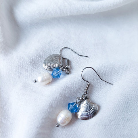 Handmade natural river pearl and seashell dangle earrings. The delight of all seaside lovers!  With acrylic beads and stainless steal hypoallergenic pendant and hook.