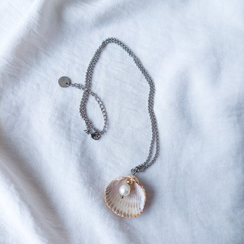 Handmade natural river pearl and seashell pendant, with a stainless steel necklace. The delight of all seaside lovers!