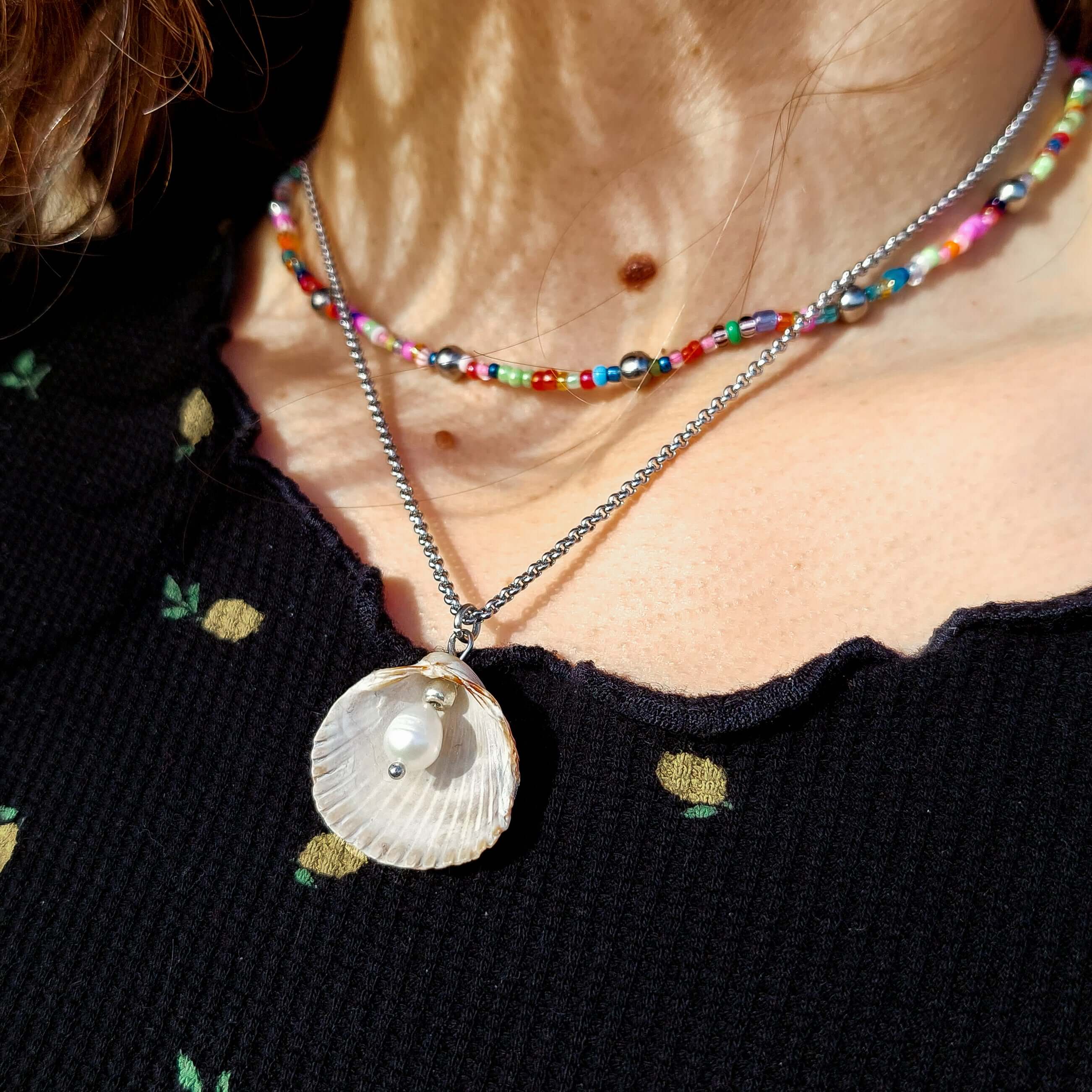 Handmade natural river pearl and seashell pendant, with a stainless steel necklace. The delight of all seaside lovers!